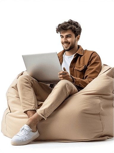 Man using laptop on a beanbag